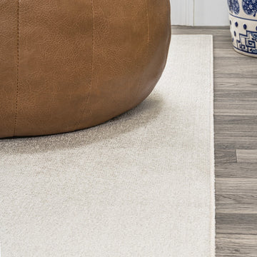 Twyla Classic Solid Low-Pile Machine-Washable Area Rug